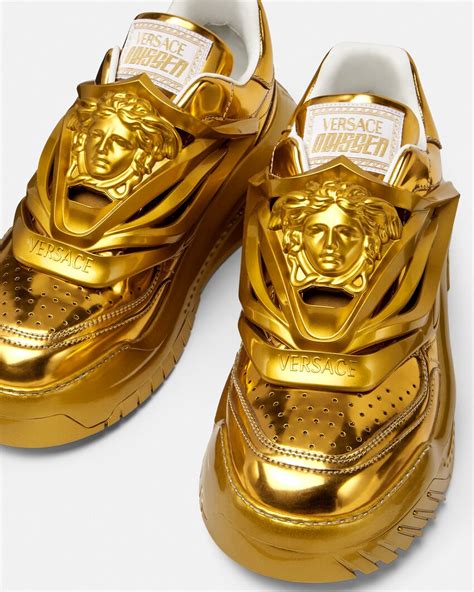 gold Versace shoes